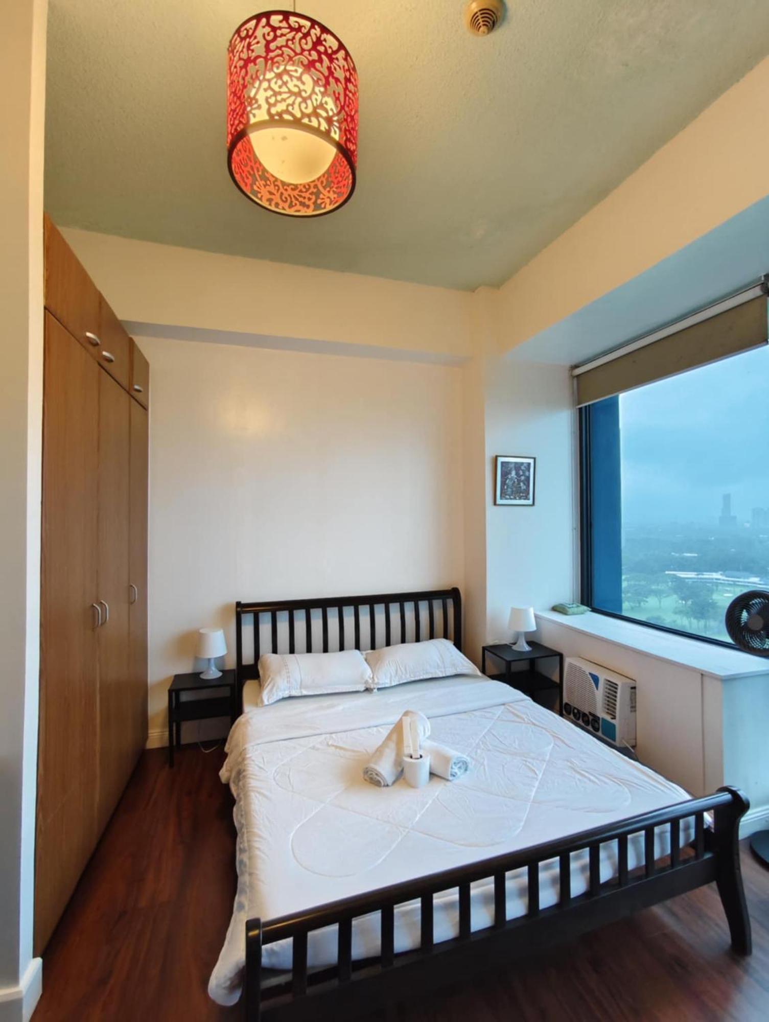 Bellagio One Bedrroom Bgc Burgos Circle By Christine Suites Ph Taguig Dış mekan fotoğraf